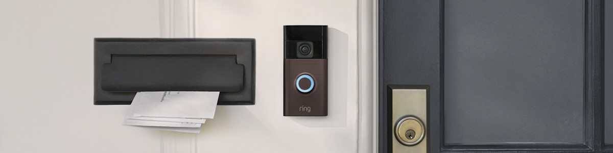 Ring Video Doorbell and letterbox on black front door