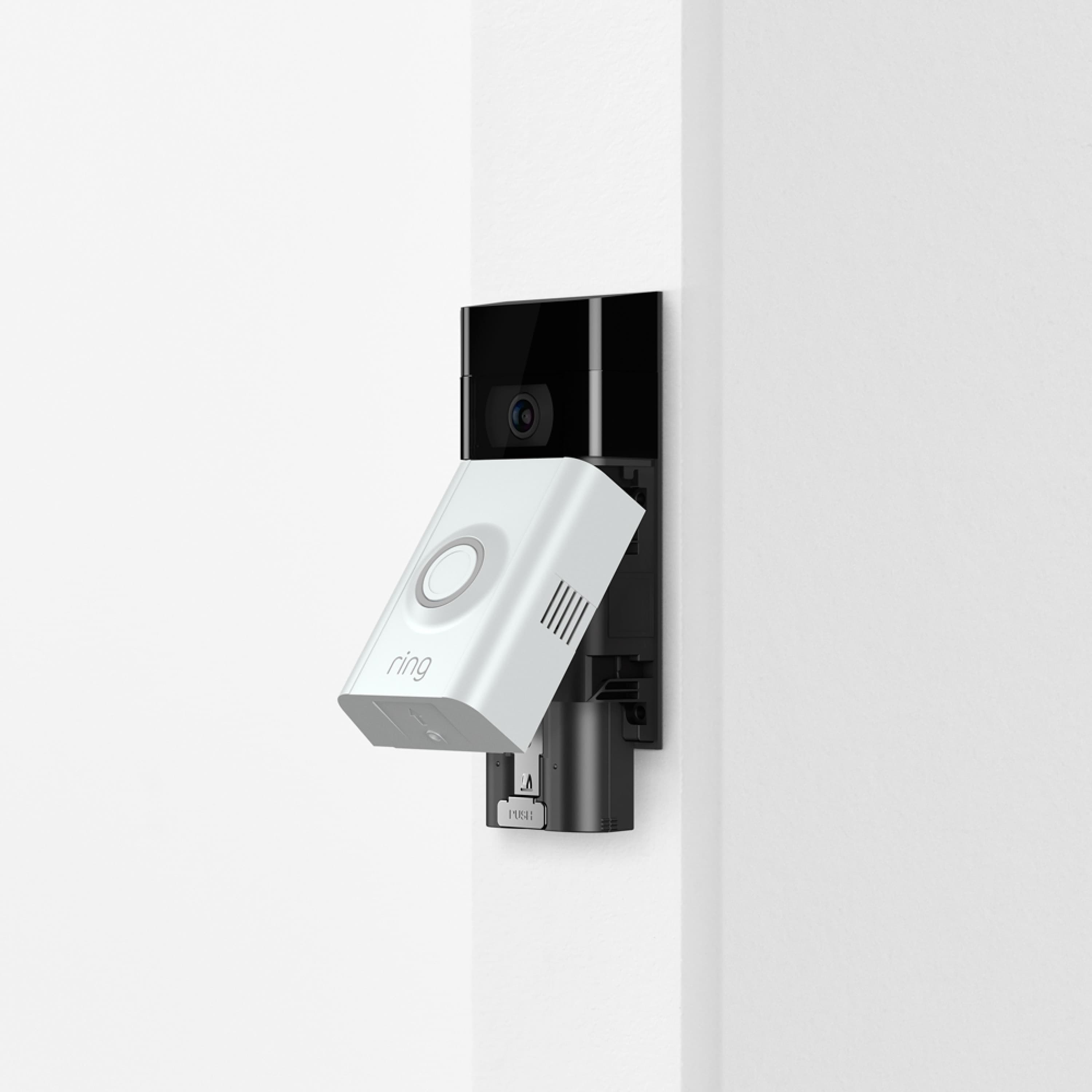 Quick Release Battery Pack - Ring video doorbell, faceplate open with Quick Release Battery Pack partially removed, showing easy battery replacement.