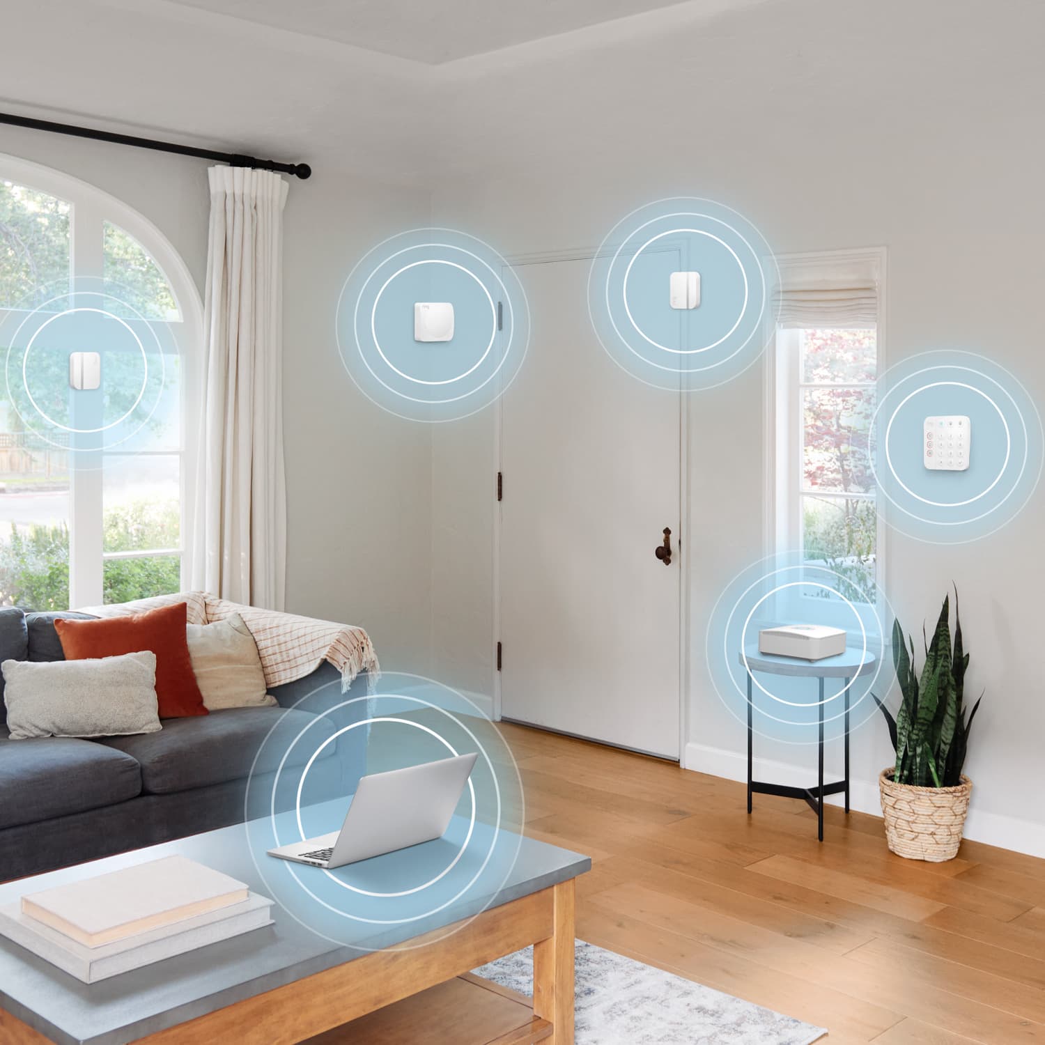 Alarm Security Kit, 14-Piece (2nd Generation) - Living room with Ring Alarm Security Kit devices highlighted, showing connected sensors, keypad, and base station.