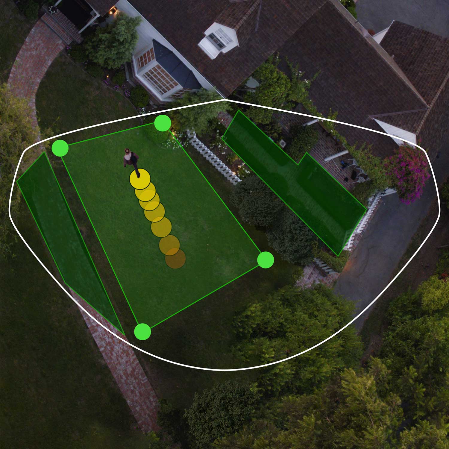 Floodlight Cam Pro (Featuring Retinal 2K) - Aerial view of a house and yard showing Ring Floodlight Cam Pro's motion detection zones and Bird's Eye View path highlighted in green and yellow.