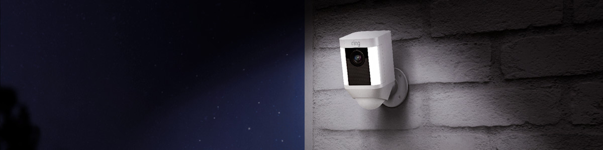 White Ring security camera mounted on exterior wall